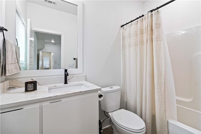 204 NE Healing Springs St, Bentonville, AR 72713 - bathroom with vanity, toilet, and shower / bath combo