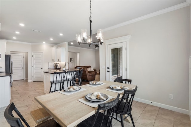 2009 Abbott Ln, Pea Ridge, AR 72751 - dining room featuring crown molding, a chandelier, recessed lighting, and light tile patterned floors