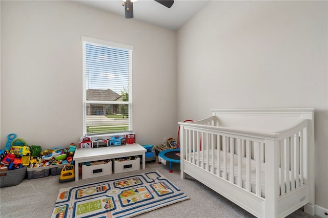 2009 Abbott Ln, Pea Ridge, AR 72751 - carpeted bedroom with a crib and ceiling fan