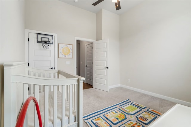 2009 Abbott Ln, Pea Ridge, AR 72751 - carpeted bedroom with a nursery area, a towering ceiling, and ceiling fan