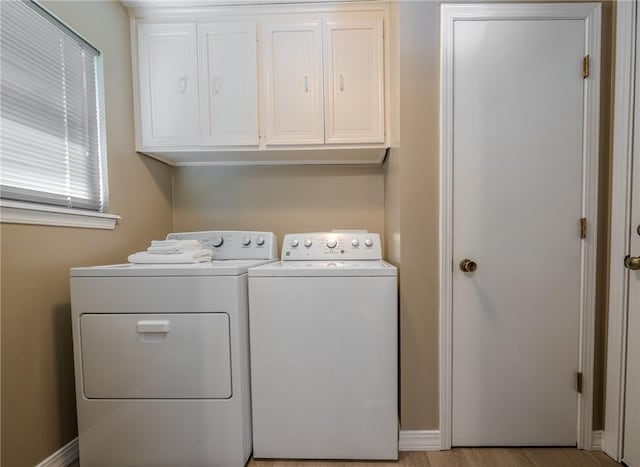 1608 Cartwright Cir, Springdale, AR 72762 - washroom with washer and dryer, cabinet space, and baseboards