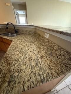 1210 Apache Dr, Bentonville, AR 72712 - kitchen view of a sink and light stone countertops