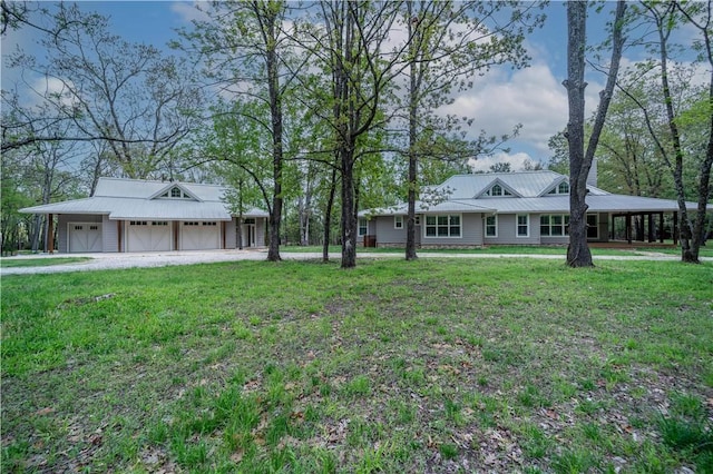 19643 Indigo Dr, Rogers, AR 72756 - view of green lawn with a garage and an outbuilding