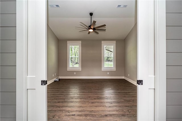 19643 Indigo Dr, Rogers, AR 72756 - empty room featuring a ceiling fan, wood finished floors, baseboards, and lofted ceiling