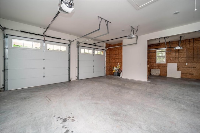 19643 Indigo Dr, Rogers, AR 72756 - garage featuring a garage door opener