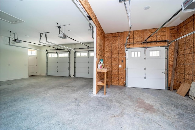 19643 Indigo Dr, Rogers, AR 72756 - garage featuring a garage door opener