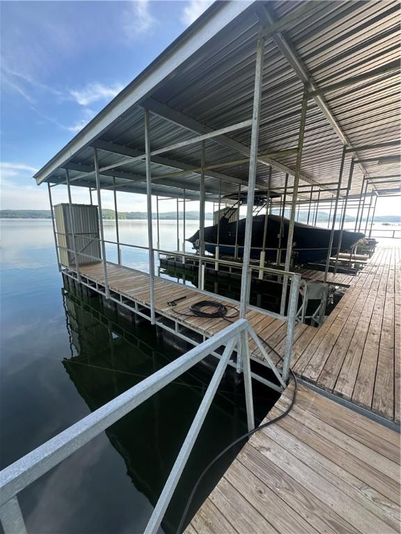 19643 Indigo Dr, Rogers, AR 72756 - dock featuring a water view and boat lift