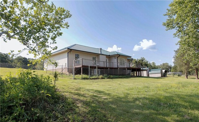 19105 Feather Hill Rd, Elkins, AR 72727 - view of green lawn with a wooden deck