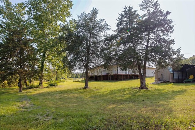 19105 Feather Hill Rd, Elkins, AR 72727 - view of grassy yard with a carport