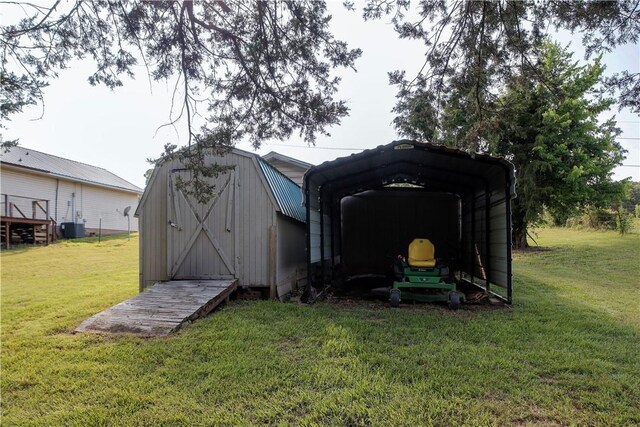 19105 Feather Hill Rd, Elkins, AR 72727 - view of shed featuring a carport