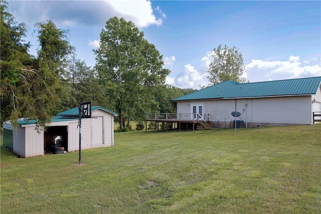 19105 Feather Hill Rd, Elkins, AR 72727 - view of grassy yard with a deck and a garage