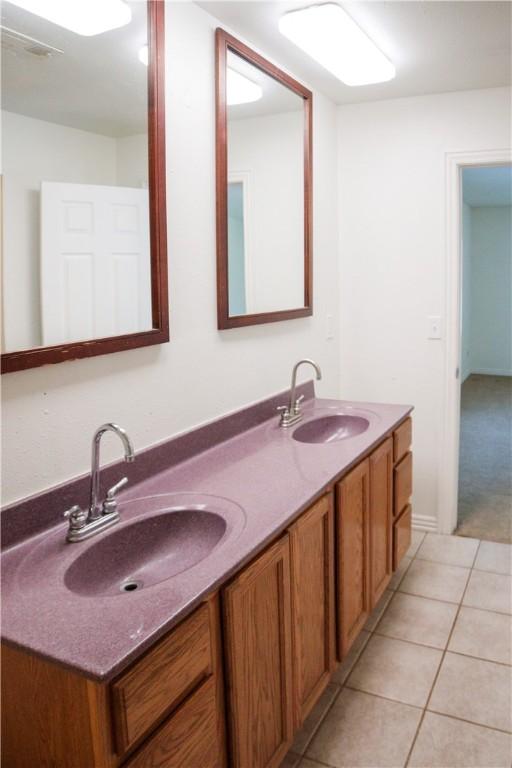 19105 Feather Hill Rd, Elkins, AR 72727 - full bath with double vanity and tile patterned flooring