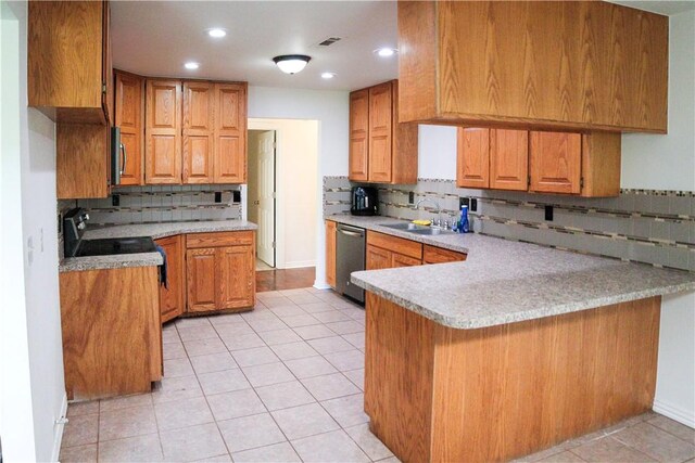 19105 Feather Hill Rd, Elkins, AR 72727 - kitchen featuring stainless steel appliances, a sink, a peninsula, decorative backsplash, and light tile patterned floors