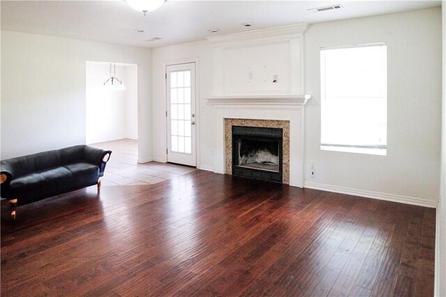 19105 Feather Hill Rd, Elkins, AR 72727 - living room featuring wood-type flooring, baseboards, and a fireplace