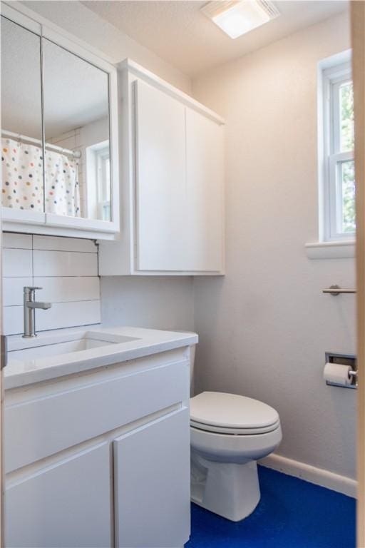 1205 NE 2nd St, Bentonville, AR 72712 - bathroom featuring vanity and a shower with shower curtain