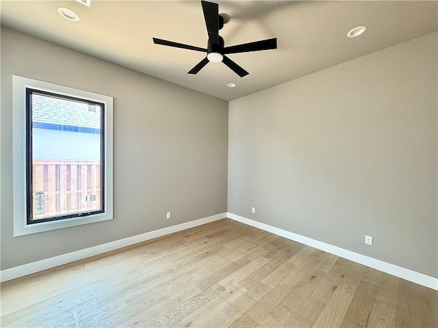 6702 SW Brilliance Ter, Bentonville, AR 72713 - unfurnished room with light wood finished floors, baseboards, ceiling fan, and recessed lighting