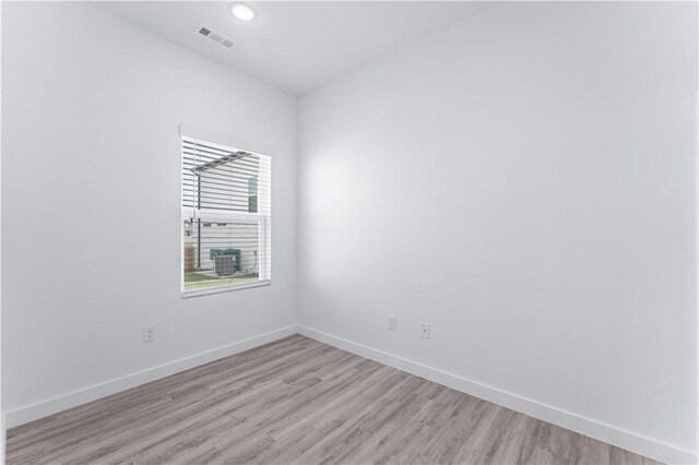 841 States Ave, Bentonville, AR 72713 - unfurnished room with light wood finished floors and baseboards