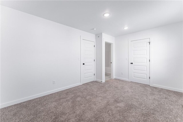 841 States Ave, Bentonville, AR 72713 - unfurnished bedroom with carpet flooring, recessed lighting, baseboards, and a closet