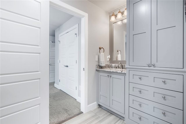 531 Chaparral St, Centerton, AR 72719 - bathroom featuring vanity and baseboards