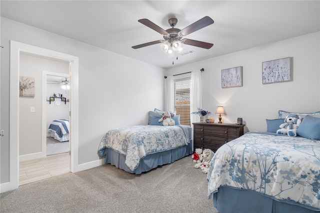 531 Chaparral St, Centerton, AR 72719 - carpeted bedroom with baseboards and a ceiling fan