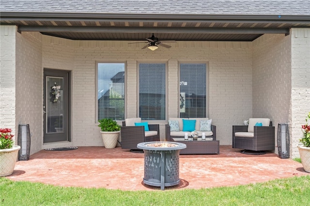 531 Chaparral St, Centerton, AR 72719 - view of patio with a ceiling fan and an outdoor living space with a fire pit