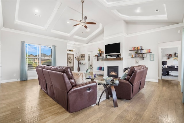 531 Chaparral St, Centerton, AR 72719 - living area with a ceiling fan, a glass covered fireplace, light wood-type flooring, baseboards, and high vaulted ceiling