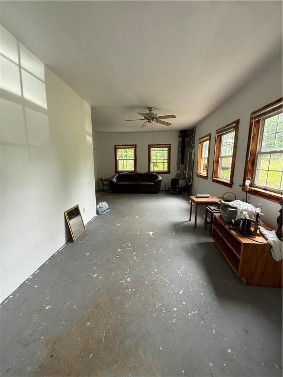 120 Walnut Rdg, Berryville, AR 72616 - living room featuring ceiling fan and concrete floors