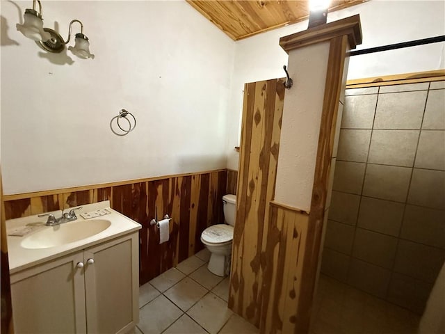 120 Walnut Rdg, Berryville, AR 72616 - full bath with wainscoting, vanity, wooden walls, tile patterned flooring, and wood ceiling