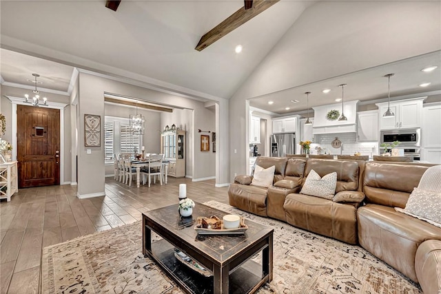 1300 Eureka Rd, Centerton, AR 72719 - living room featuring recessed lighting, light wood-style flooring, a chandelier, baseboards, and crown molding