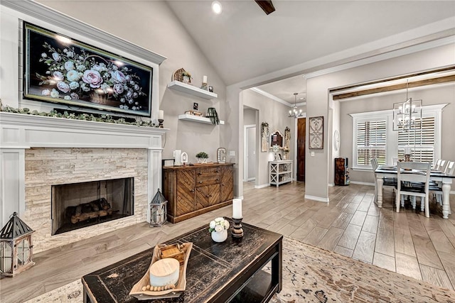 1300 Eureka Rd, Centerton, AR 72719 - living room with a chandelier, wood finished floors, baseboards, lofted ceiling, and a fireplace