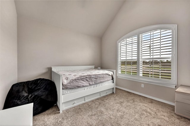 1300 Eureka Rd, Centerton, AR 72719 - bedroom featuring carpet floors, vaulted ceiling, and baseboards