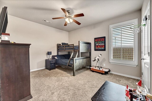 1300 Eureka Rd, Centerton, AR 72719 - carpeted bedroom with baseboards and ceiling fan