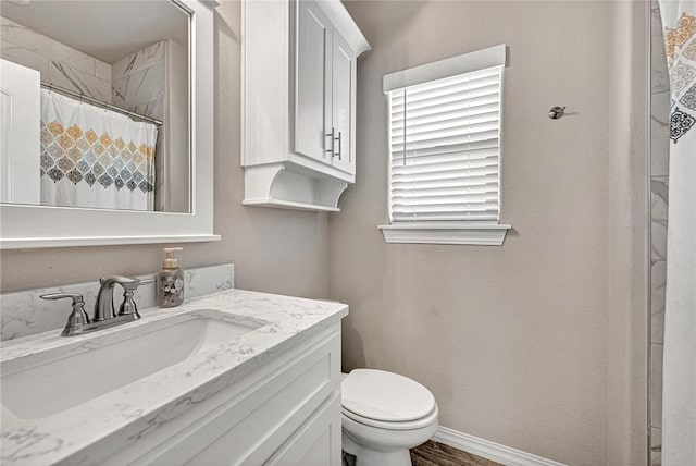 1300 Eureka Rd, Centerton, AR 72719 - full bathroom featuring vanity, toilet, a shower with shower curtain, and baseboards