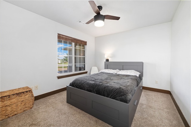6108 SW Lee Ln, Bentonville, AR 72713 - bedroom featuring carpet floors, baseboards, and a ceiling fan