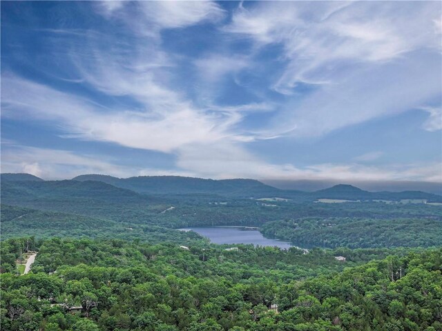 7 Bobwhite Ln, Holiday Island, AR 72631 - view of mountain backdrop with a forest and a nearby body of water