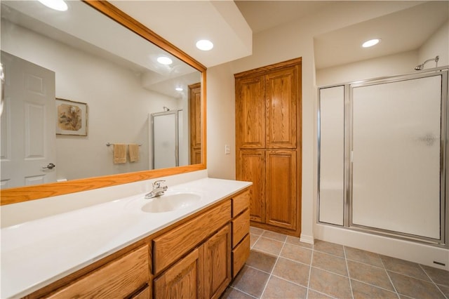 18 Cheviot Ln, Bella Vista, AR 72715 - full bathroom with a shower stall, vanity, recessed lighting, and tile patterned floors