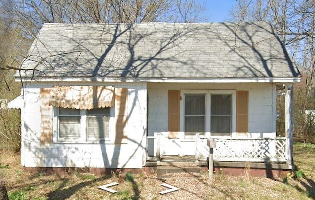 106 E Main St, Ozark, AR 72949 - view of front of home featuring a shingled roof