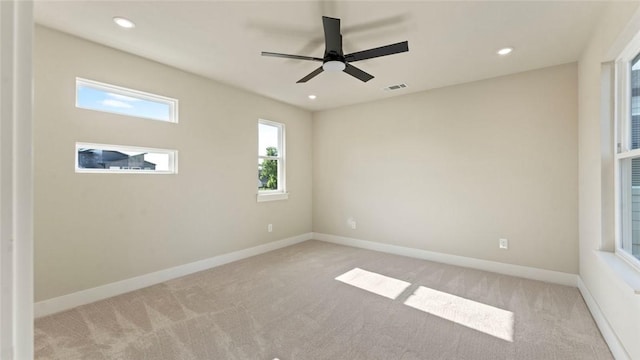 1209 SW Journey Ln, Bentonville, AR 72713 - unfurnished room featuring light carpet, ceiling fan, and recessed lighting