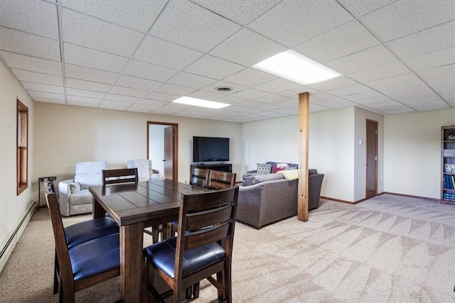 326 Hillcrest Rd, Eureka Springs, AR 72631 - dining area featuring carpet floors, baseboard heating, a drop ceiling, and baseboards