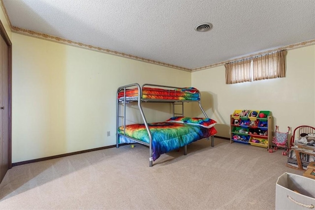 326 Hillcrest Rd, Eureka Springs, AR 72631 - carpeted bedroom with a textured ceiling, crown molding, and baseboards