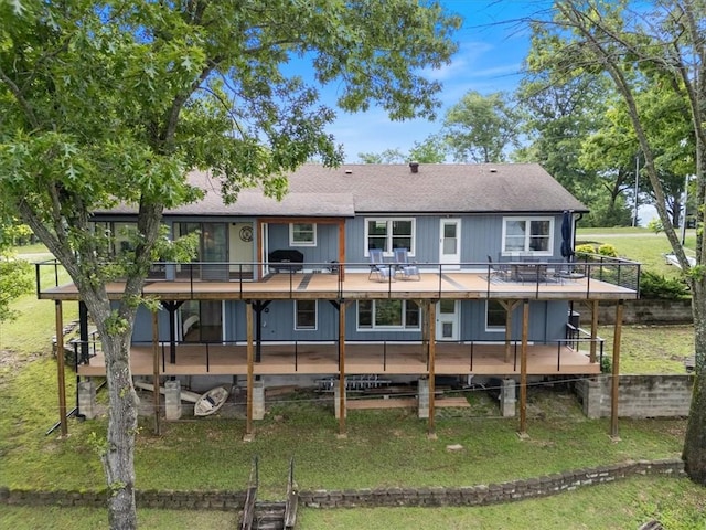 326 Hillcrest Rd, Eureka Springs, AR 72631 - back of house with roof with shingles, a lawn, and a wooden deck