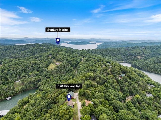 326 Hillcrest Rd, Eureka Springs, AR 72631 - drone / aerial view of a forest and a water and mountain view