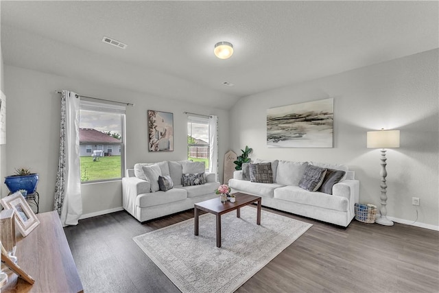 944 Maddy St, Elkins, AR 72727 - living room featuring wood finished floors and baseboards