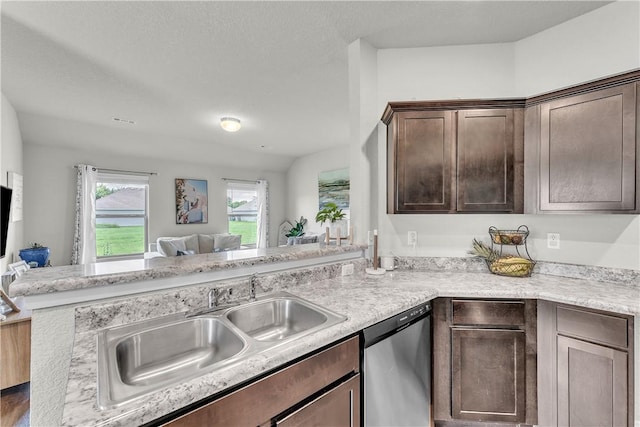 944 Maddy St, Elkins, AR 72727 - kitchen featuring stainless steel dishwasher, open floor plan, dark brown cabinets, and a peninsula