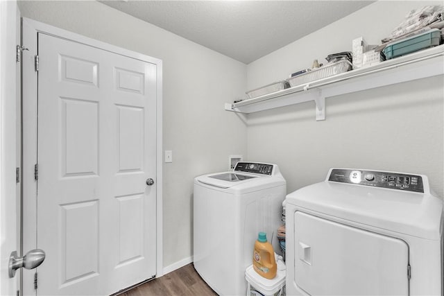 944 Maddy St, Elkins, AR 72727 - laundry room with separate washer and dryer, dark wood-type flooring, and a textured ceiling