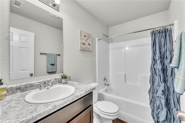944 Maddy St, Elkins, AR 72727 - bathroom with shower / tub combo, vanity, and a textured wall