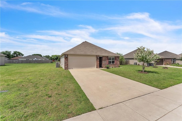 944 Maddy St, Elkins, AR 72727 - ranch-style home with driveway, an attached garage, and brick siding