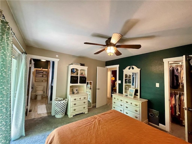 900 Dogwood St, Huntsville, AR 72740 - bedroom featuring carpet, a spacious closet, ensuite bathroom, a closet, and ceiling fan
