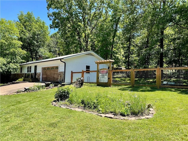 900 Dogwood St, Huntsville, AR 72740 - view of home's exterior with a garage, stone siding, and concrete driveway