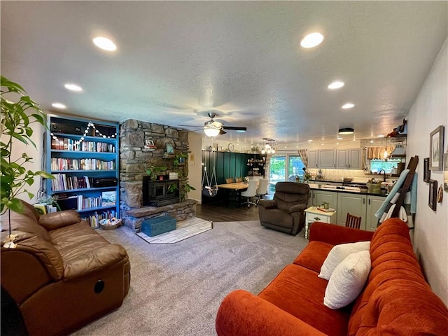 900 Dogwood St, Huntsville, AR 72740 - living room with ceiling fan, carpet floors, and recessed lighting